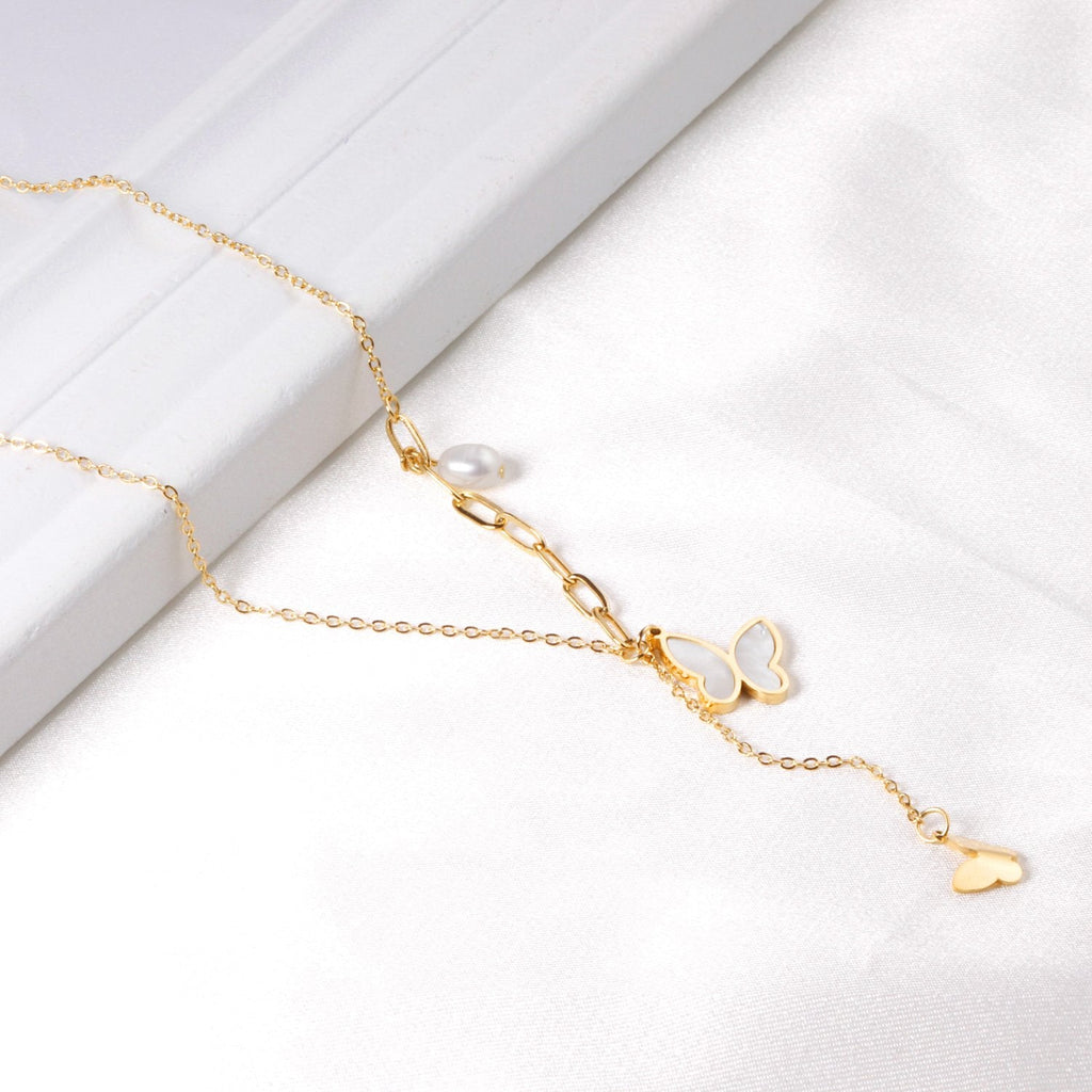 Schelpvlinderhangerketting met imitatieparel 