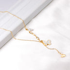 Schelpvlinderhangerketting met imitatieparel 