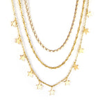 Drievoudige ketting met sterbedels 