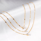 Drievoudige ketting met hartvormige hanger 