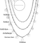 Drievoudige ketting met sterbedels 