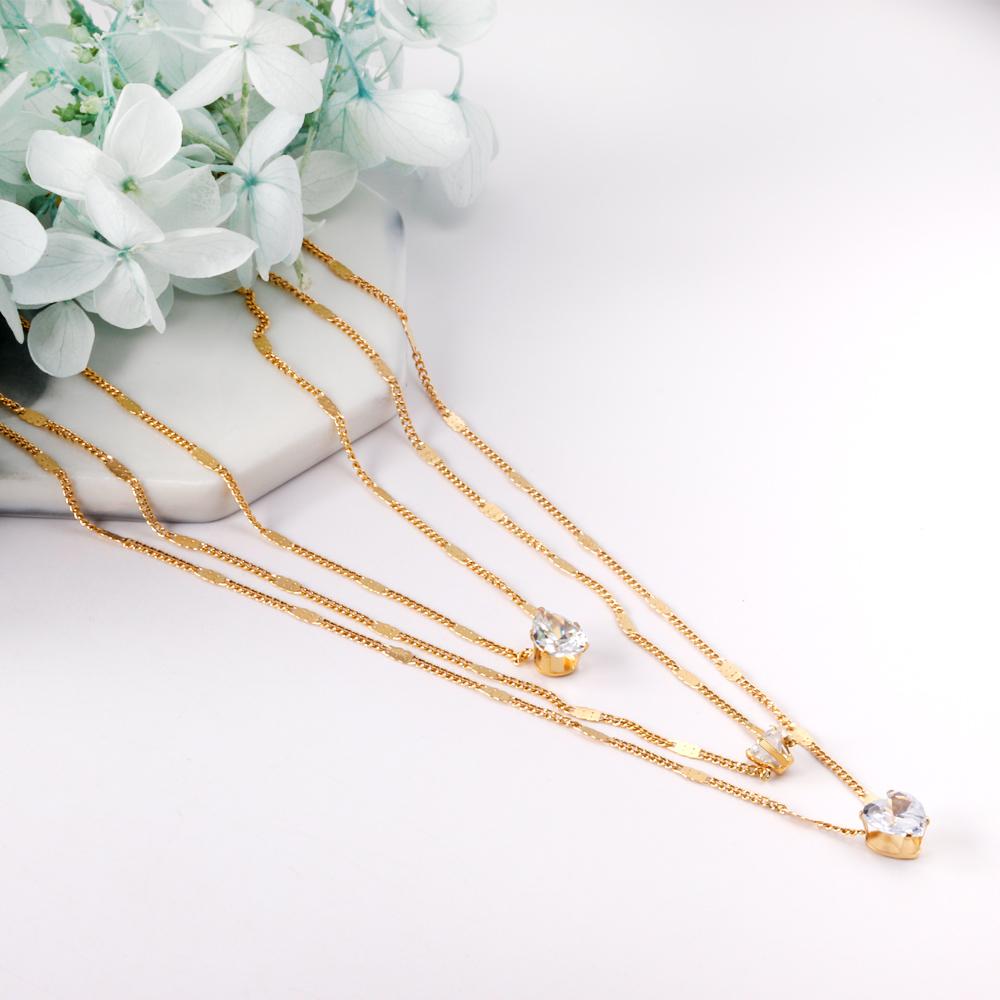 Drievoudige ketting met hartvormige hanger 
