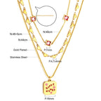 Drievoudige ketting met groen hart en roze zirkonia bedeltjes