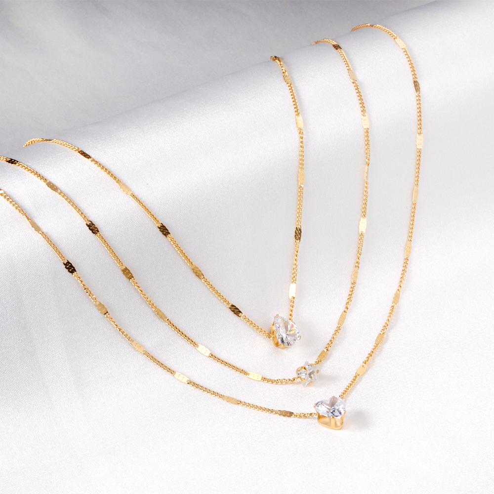 Drievoudige ketting met hartvormige hanger 